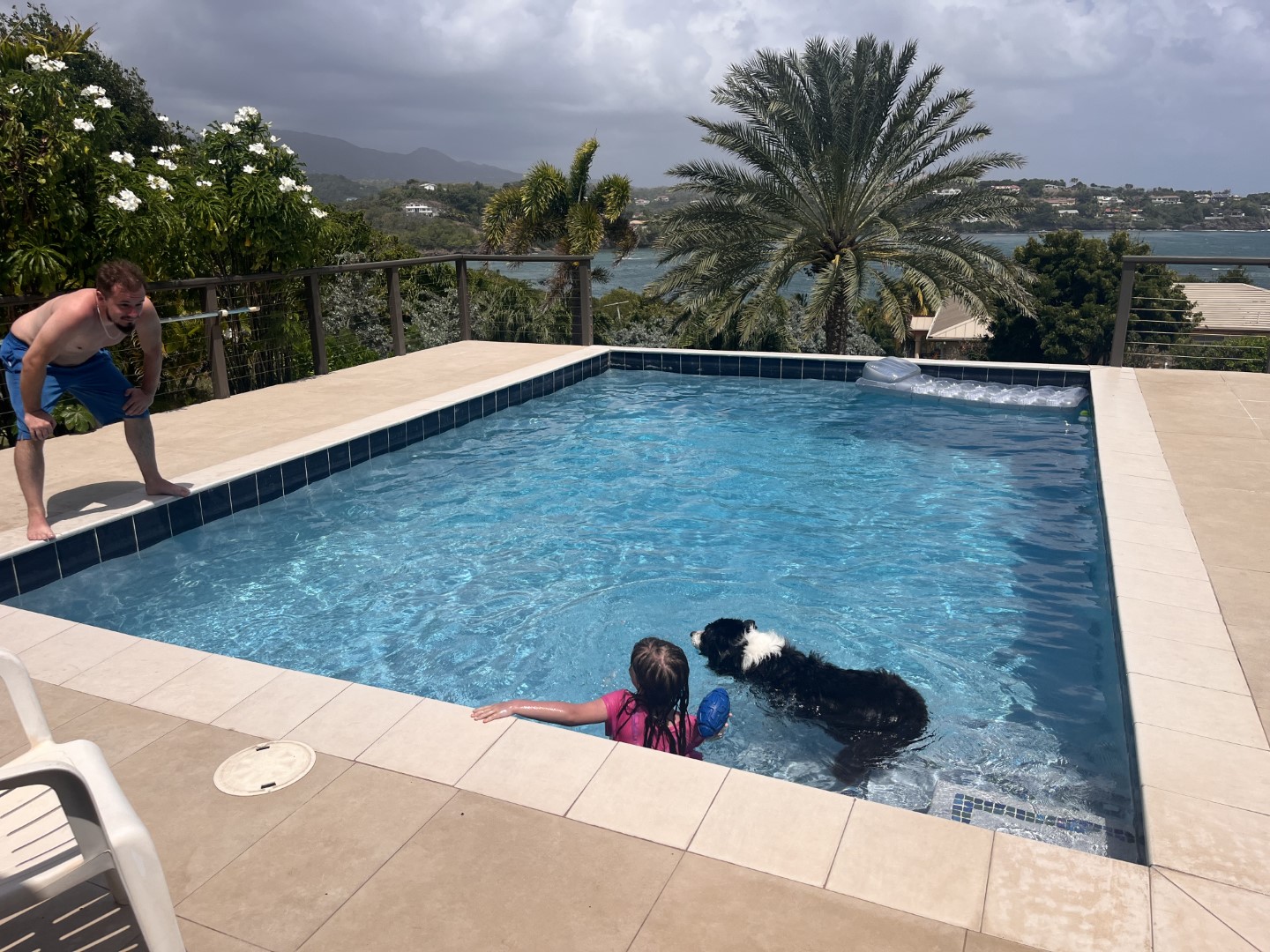 Playing with Jax in Scott and Donna's Pool travel moment 1